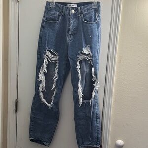 Ripped Blue Denim Jeans